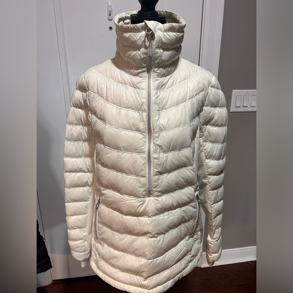 Calvin Klein puffer pull over. Cream in color. Perfect condition